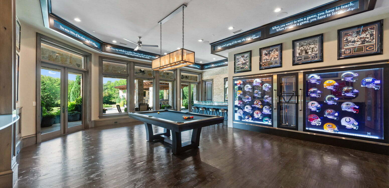 Indoor sports room with football helmet collection