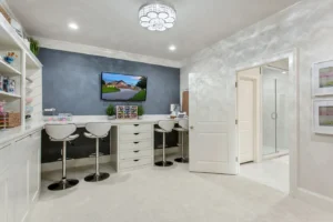 Bright craft room in Waxahachie luxury home with organized storage, work surfaces, natural light, creative space, and functional design—perfect for hobbies, projects, and artistic pursuits.